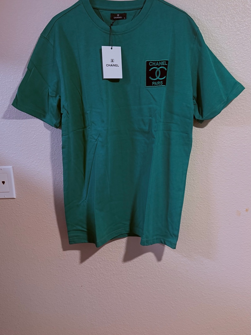 CHANEL Men’s Teal Green Logo Patch Short Sleeve Tee